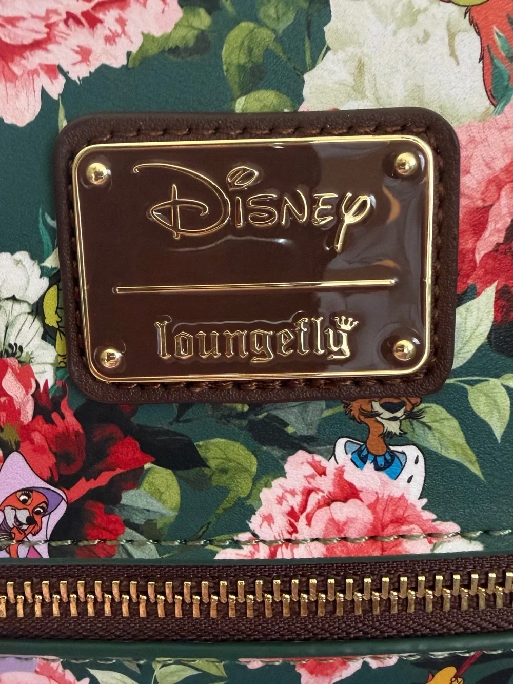 Disneys “Robin Hood”Loungefly Backpack.
